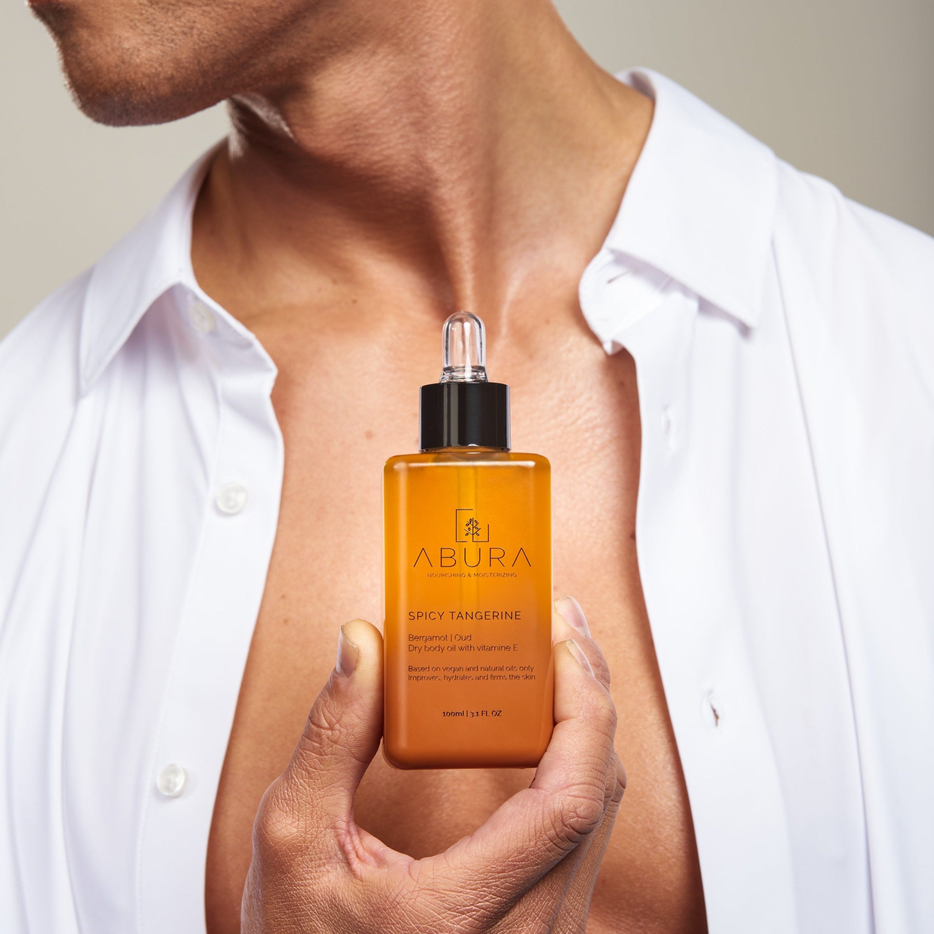 Spicy Tangerine • Hydrates • Firms • Soothes • Dry Body Oil • Vitamin E | Bergamot | Oud | Sweet Orange | 15 +Organic ingredients | African & Mediterranean rituals in 1 bottle